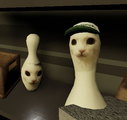 Pin Cat and his coworker in the back row